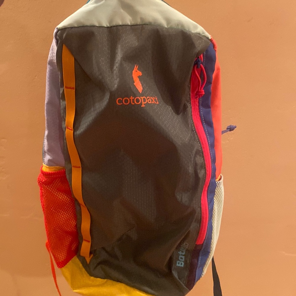 Cotopaxi multicolor backpack/daypack.